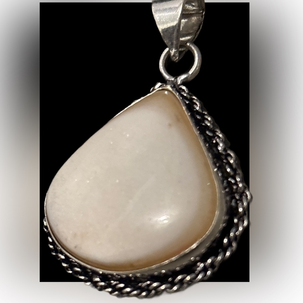 Elegant Silver and Cream Pendant